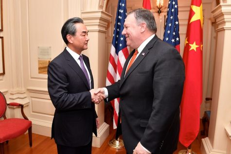 Secretary Pompeo Shakes Hands With Chinese State Councilor and Foreign Minister Wang. Free Use Image Courtesy of Flickr.com