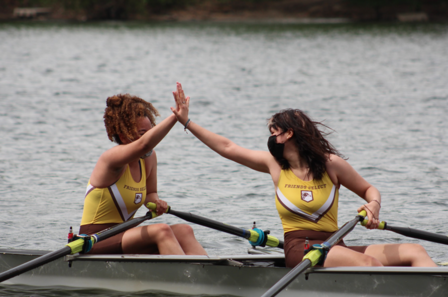 Madison Scheuer and Sophie Cucinotta High Five on the River.