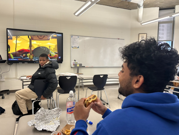 Students eat their lunch during Ninjago club. Ninjago club held its first meeting recently, bringing in a large audience of mostly underclassmen.