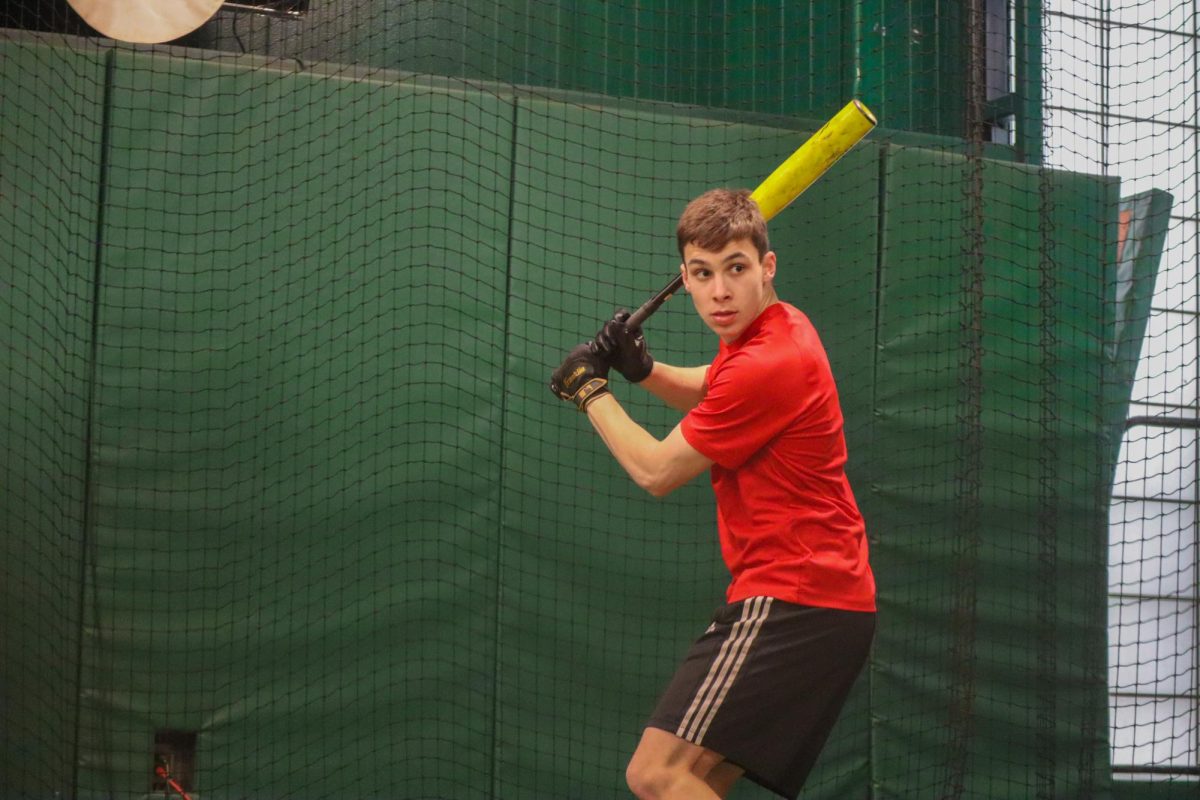 Miles Lesser '26 hitting in the batting cages at Marian Anderson Rec Center. Miles spends multiple days a week working on his swing as he prepares for the college recruiting process.