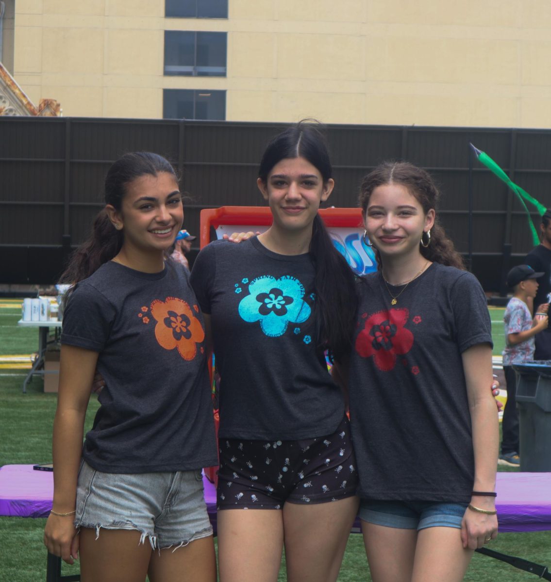 Julia D'Amico '28, Harper Emerick '28, and Veronica Giardinelli-Hill '28 at the Spring Fair.