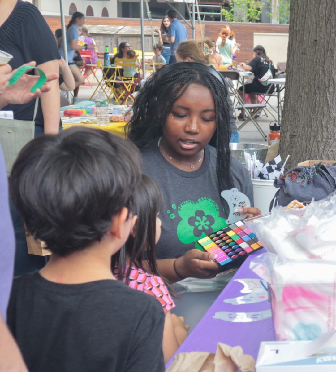 Sophia Hargrove '26 doing face painting during the Spring Fair.