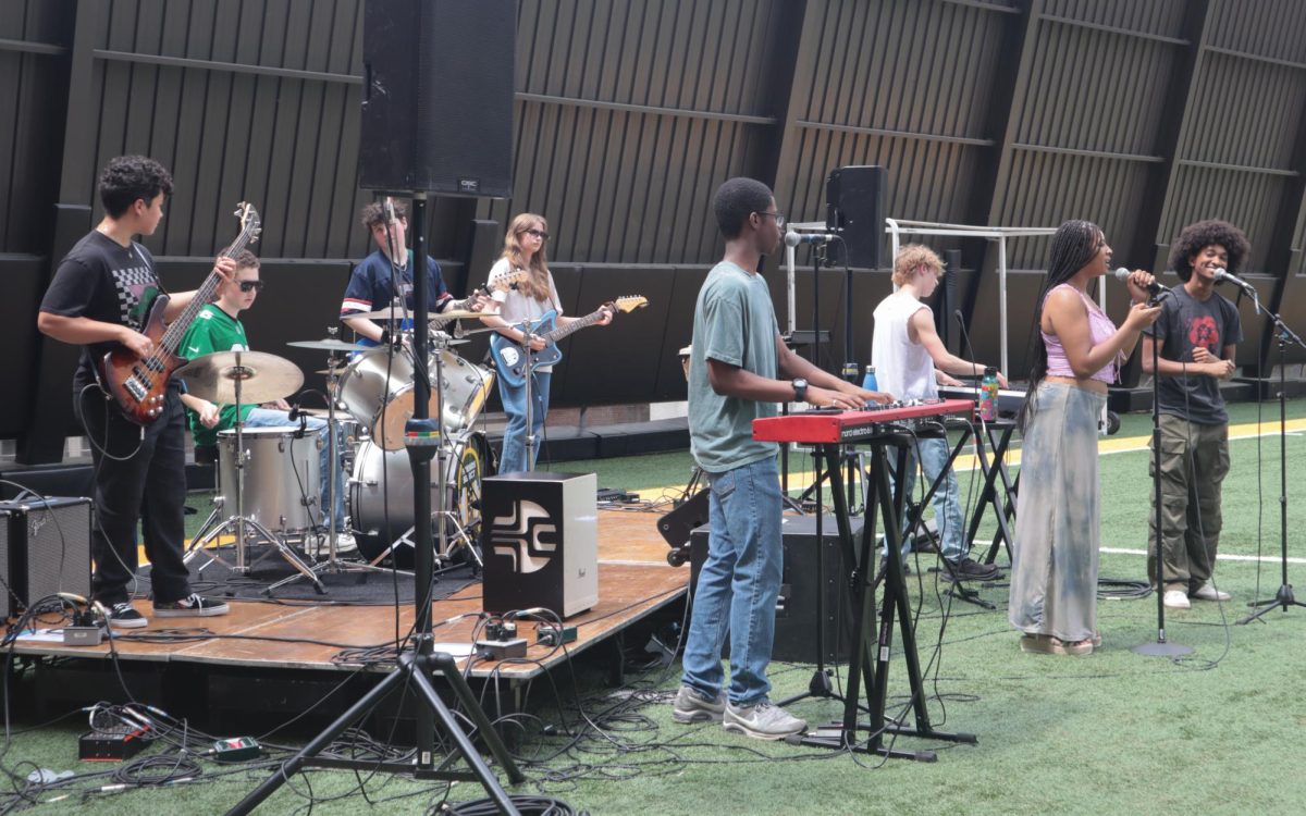Lab band playing music on the roof during the Spring Fair.