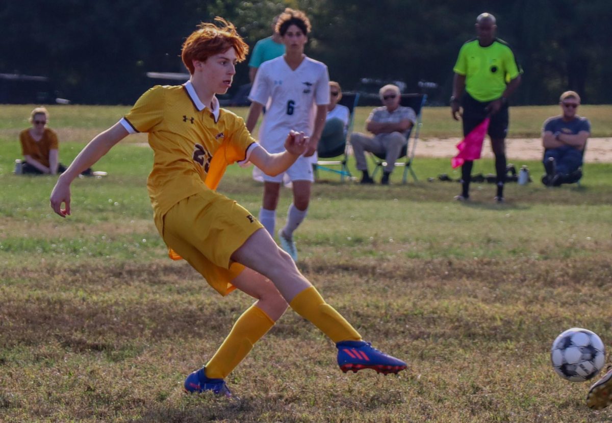 Elliot Lesser '29 shooting the ball.