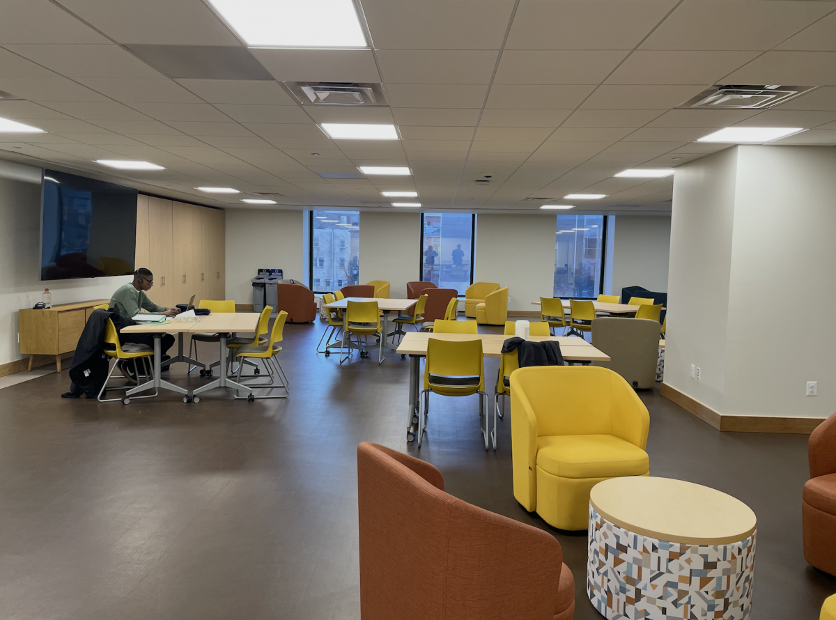 Ifeoluwa Akinyemi ‘26 works alone during a free period in The Commons. The free space is empty during most of the day, but quickly fills up during lunch and break.