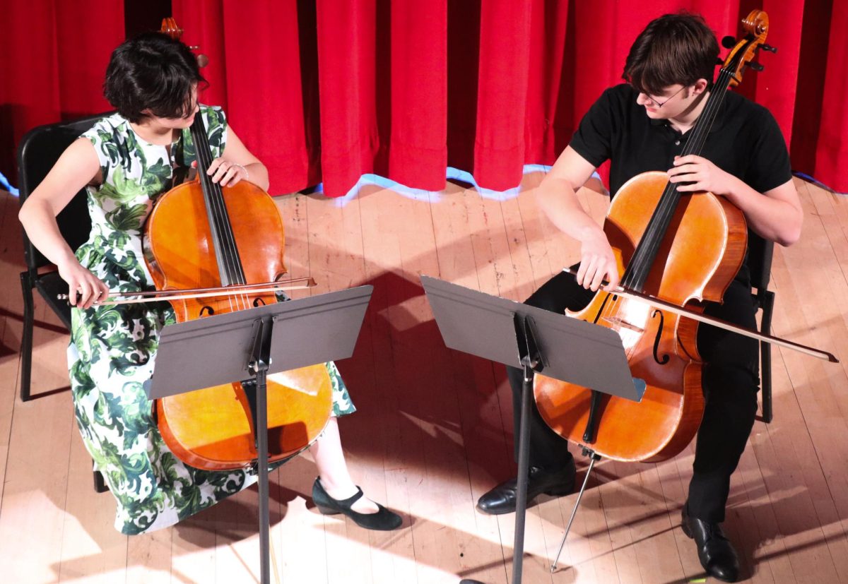 Theo Stanev Potts ‘26 and Sofia Stanev Potts ‘30 playing cello
